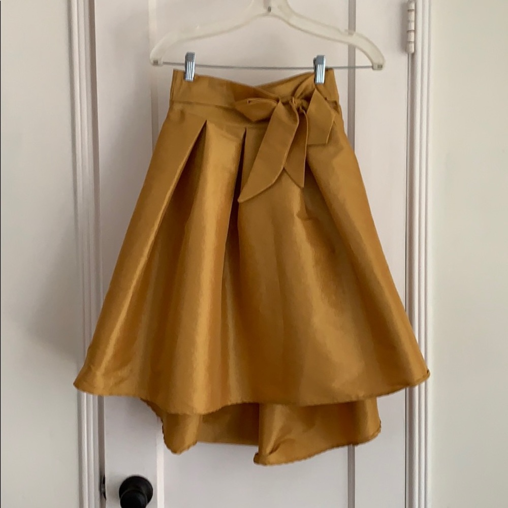 Gold flare skirt with bow